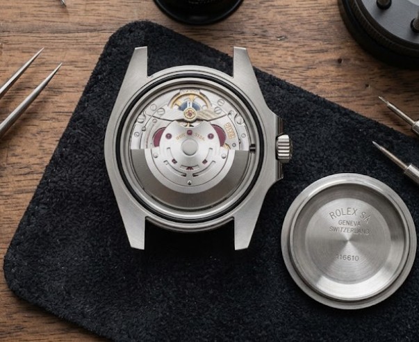 Opened Rolex caseback showing the caliber during Master Authentication